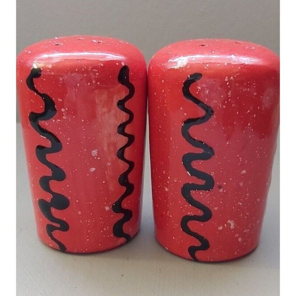 Vintage Pottery Red Salt and Pepper shakers with white speckles and black...